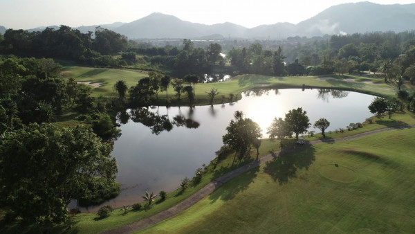 Red Mountain Golf Club Phuket Thailand lake sky nature tree golf course and grass