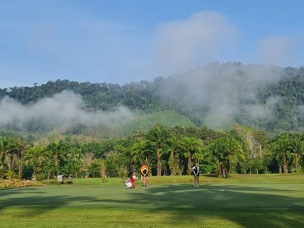 Katathong Golf Resort amp Spa 3 people grass and nature