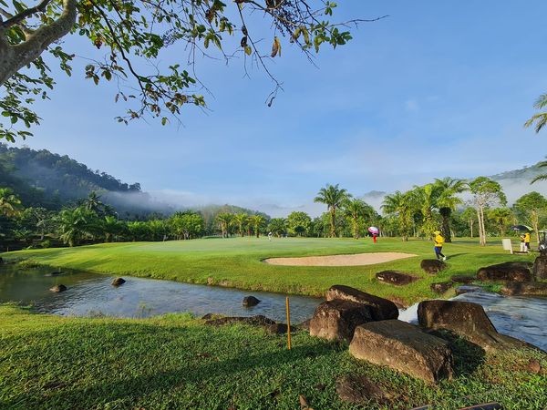Katathong Golf Resort amp Spa 3 people tree golf course nature and grass