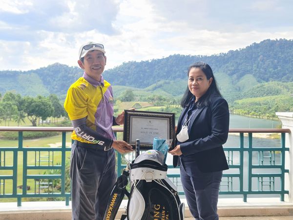 Katathong Golf Resort amp Spa 2 people and people standing