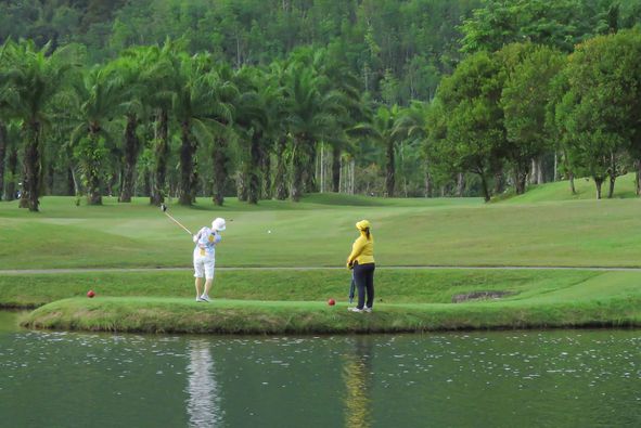 Katathong Golf Resort amp Spa 2 people nature grass and golf course