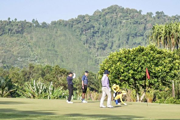 Katathong Golf Resort amp Spa 3 people and grass