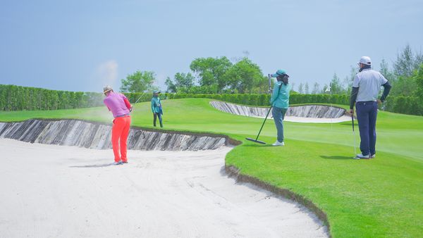 Aquella Golf amp Country Club 4 people people golfing golf buggy and golf course