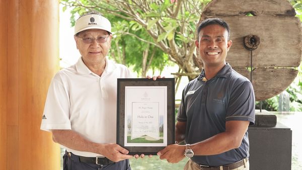 Aquella Golf amp Country Club 2 people people golfing golf course and text