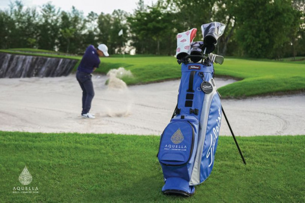 Aquella Golf amp Country Club 1 person golfing golf course and text