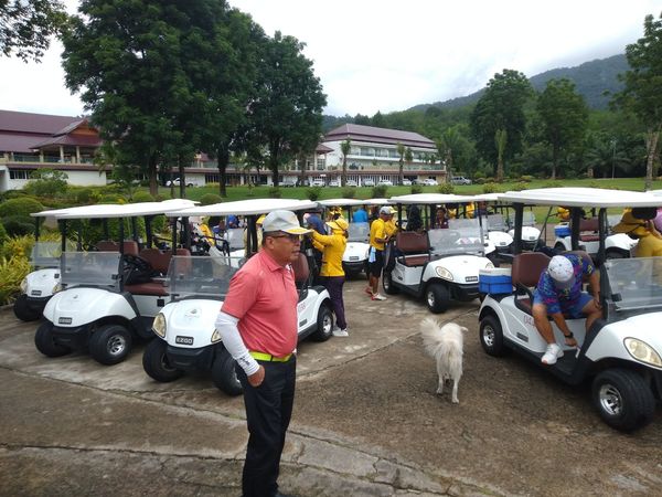 Katathong Golf Resort amp Spa 4 people people golfing golf cart golf course and text