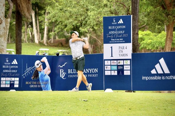 Blue Canyon Country Club 2 people people golfing golf club golf course and text