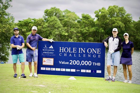 Blue Canyon Country Club 4 people people golfing golf course and text