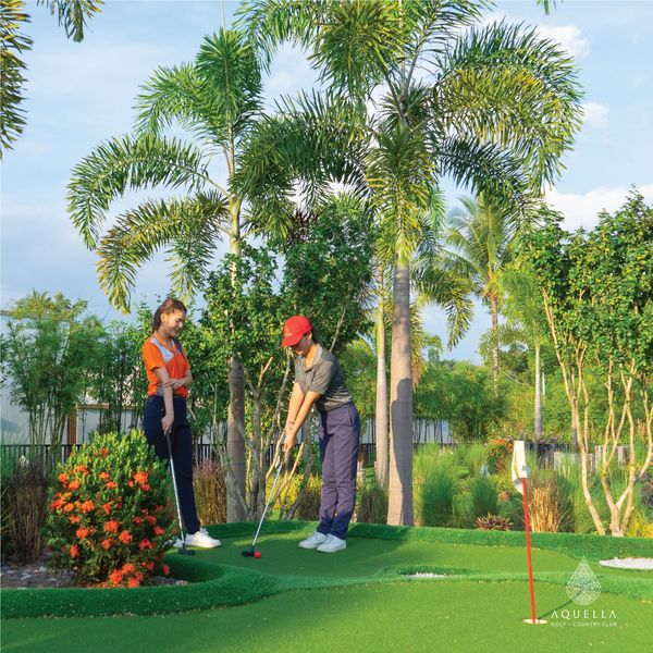 Aquella Golf amp Country Club 2 people people golfing and golf course