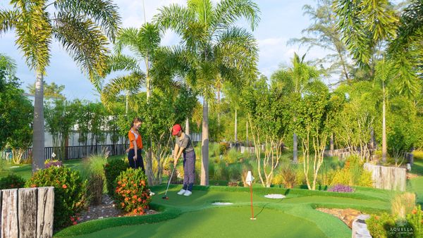 Aquella Golf amp Country Club 2 people people golfing grass and golf course