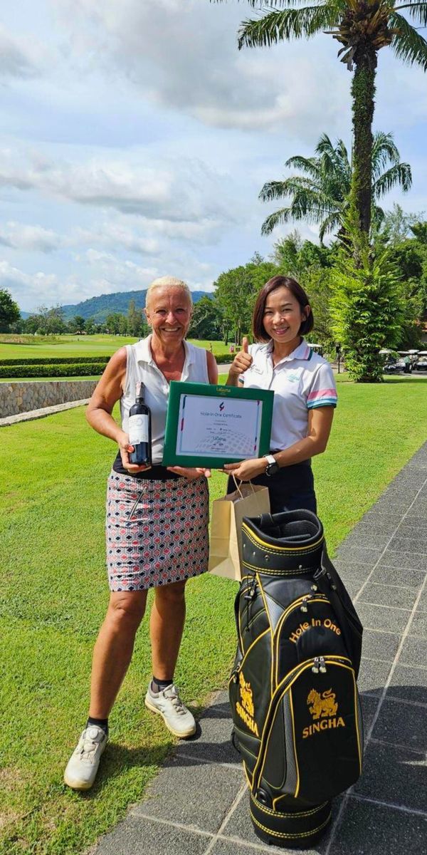 Laguna Golf Phuket nbsp 2 คน ผู้คนกำลังตีกอล์ฟ สนามกอล์ฟ และ ข้อความ