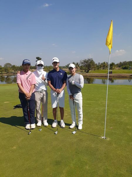 Dancoon Golf Club 4 people grass and golf course