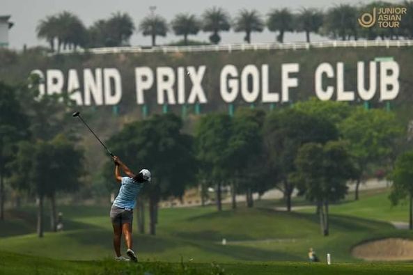 Grand Prix Golf Club 1 person golfing and golf course