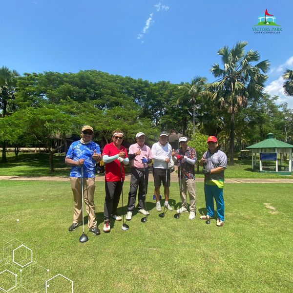 Victory Park Golf amp Country Club 6 people people golfing golf course and text